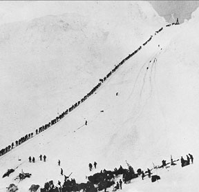 MinersClimbChilkoot Miners climb the Chilkoot Trail