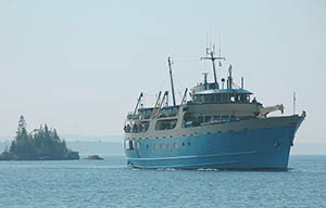 The Ranger III pulling into Rock Harbor at Isle Royale National Park.